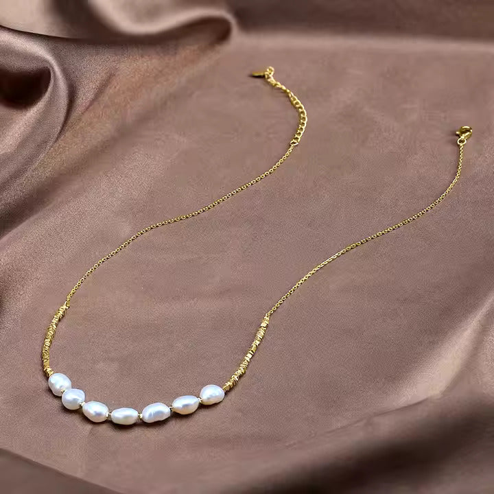 Freshwater pearl necklace with round, lustrous pearls on an elegant strand, ideal for weddings, formal events, or everyday sophistication. Perfect gift for women, crafted with high-quality freshwater pearls.