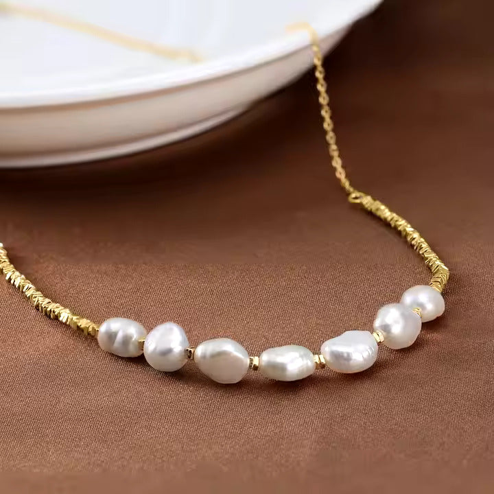 Freshwater pearl necklace with round, lustrous pearls on an elegant strand, ideal for weddings, formal events, or everyday sophistication. Perfect gift for women, crafted with high-quality freshwater pearls.